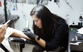 Tattoo artist Chloe