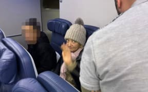 CNN's Saskya Vandoorne captured an image of Delta stowaway Svetlana Dali as her return flight landed at JFK on December 4, 2024.
