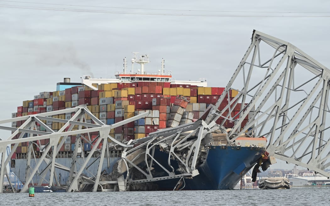 Baltimore bridge collapses after being struck by ship, six presumed dead