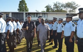 Solomon Islands Prime Minister Manasseh Sogavare inspects a guard of honour by members of the RSIPF before the opening of the National Response Department facility.