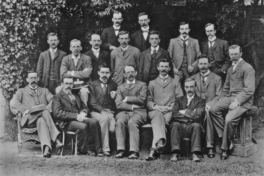 British physicist JJ Thomson with his research students at Cambridge, in 1898. Ernest Rutherford fourth from left in middle row.