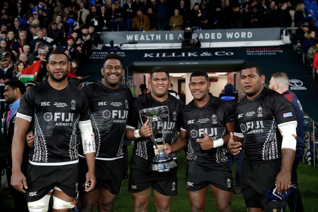 Mesulame Kunavula, Temo Mayanavanua, Veremalua Vugakoto, Peni Matawalu and Joeli Veitayaki celebrate Fiji's Killik Cup win over the Barbarians.