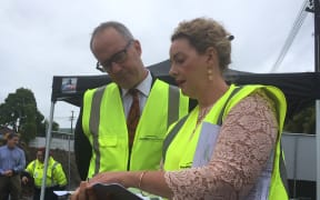 Housing Minister Phil Twyford with Housing NZ senior development manager Cara Doonan.