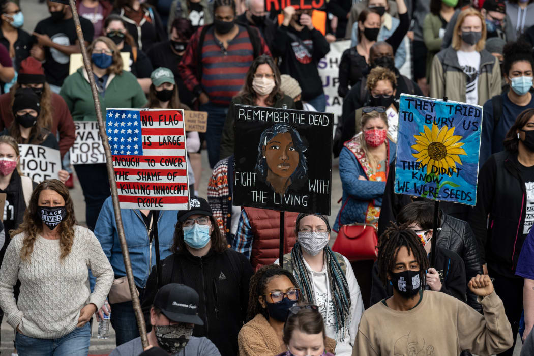 Protesters and members of Until Freedom lead a march from Jefferson Square Park in Louisville, to protest the death of Breonna Taylor a year ago.