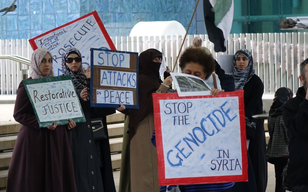 Protesters in Auckland called for bombings of civilians in Syria to stop.