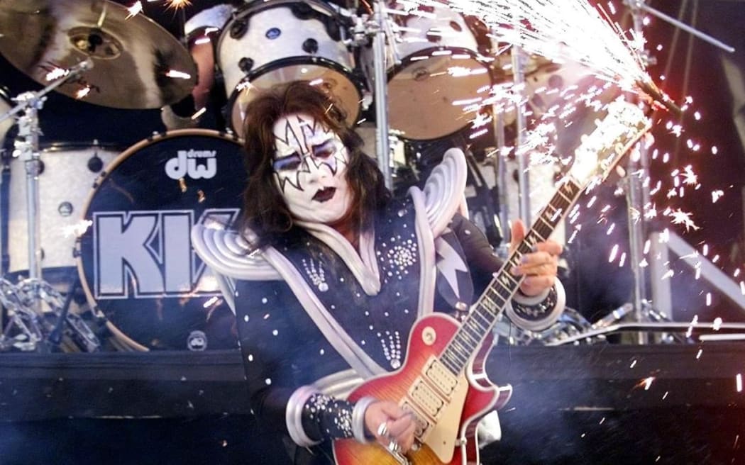 Ace Frehley performs with rock group KISS at Super Bowl XXXIII.