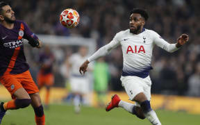 Manchester City's Riyad Mahrez, left, challenges for the ball with Tottenham's Danny Rose during the Champions League,  first-leg soccer match between Tottenham Hotspur and Manchester City at the Tottenham Hotspur stadium in London, Tuesday, April 9, 2019.