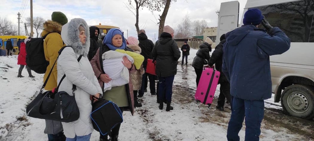 SUMY, UKRAINE - MARCH 8: (----EDITORIAL USE ONLY â MANDATORY CREDIT - "UKRAINIAN PRESIDENCY / HANDOUT" - NO MARKETING NO ADVERTISING CAMPAIGNS - DISTRIBUTED AS A SERVICE TO CLIENTS----) Civilians flee the city after temporary ceasefire announced on March 8, 2022 in Sumy, Ukraine.