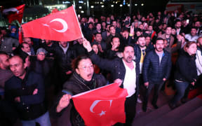 Supporters of opposition Republican People's Party (CHP) celebrate after early results for Ankara mayor in local election in Ankara, Turkey, March  31, 2019.