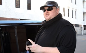 Kim Dotcom outside the Auckland courthouse.