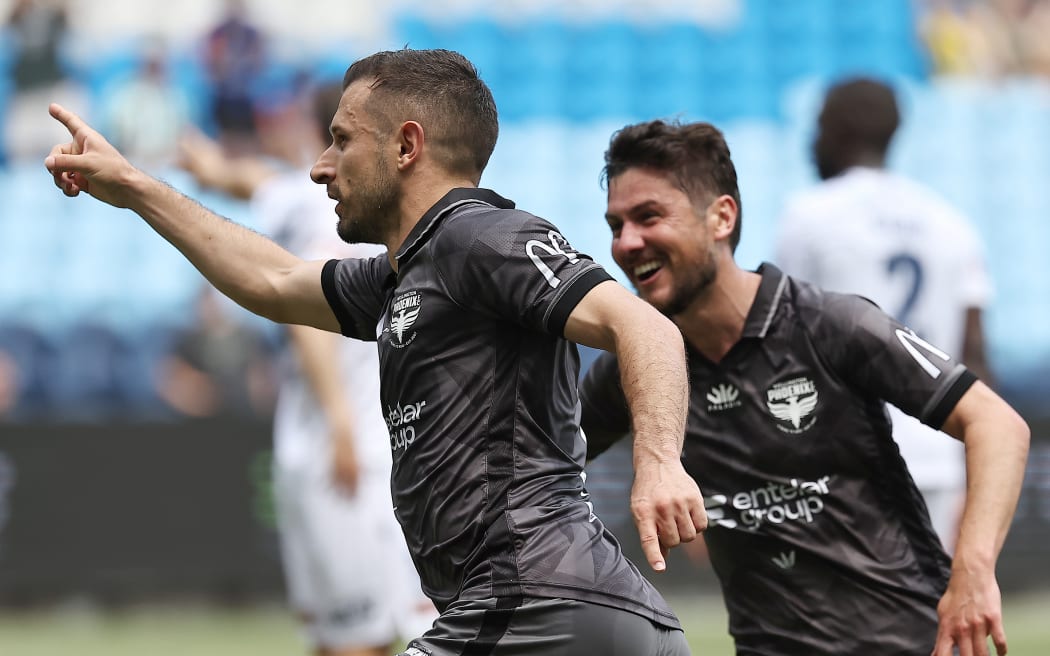 Kosta Barbarouses celebrates scoring the winning goal for Wellington Phoenix in their A-League match against Melbourne Victory at Allianz Stadium in Sydney, November 24, 2024.