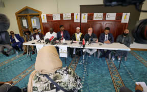 Imam Gamal Fouda, Imam Alabi Lateef Zikrullah, Abdigani Ali, Faisal Sayed, Ahmed Khan and Muslim academic Anthony Green after the Royal Commission report is released.