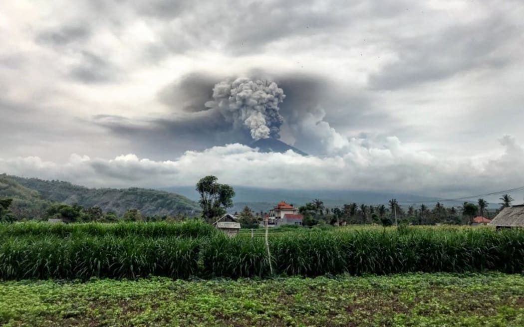 Mount Agung spews ash into the sky on 27 November.