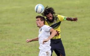 Erakor Golden Star's Jason Thomas wins the ball over Team Wellington's Angus Kilkolly. OFC Champions League 2019, Group C, Erakor Golden Star v Team Wellington.