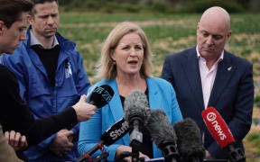 Christopher Luxon and Louise Upston speak to media from Phil Greig Strawberry Farm in Auckland on 26 September 2023.