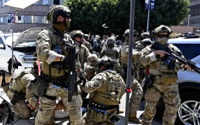 Armed United States Customs and Border Protection (CBP) agents detain protesters in Los Angeles, California, United States, on June 10, 2025. ( The Yomiuri Shimbun ) (Photo by Kayo Goto / The Yomiuri Shimbun via AFP)
