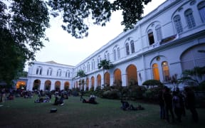 Protesters are seen in the grounds of the president's official residence after the anti government protest on 9 July, 2022, in Colombo, Sri Lanka.