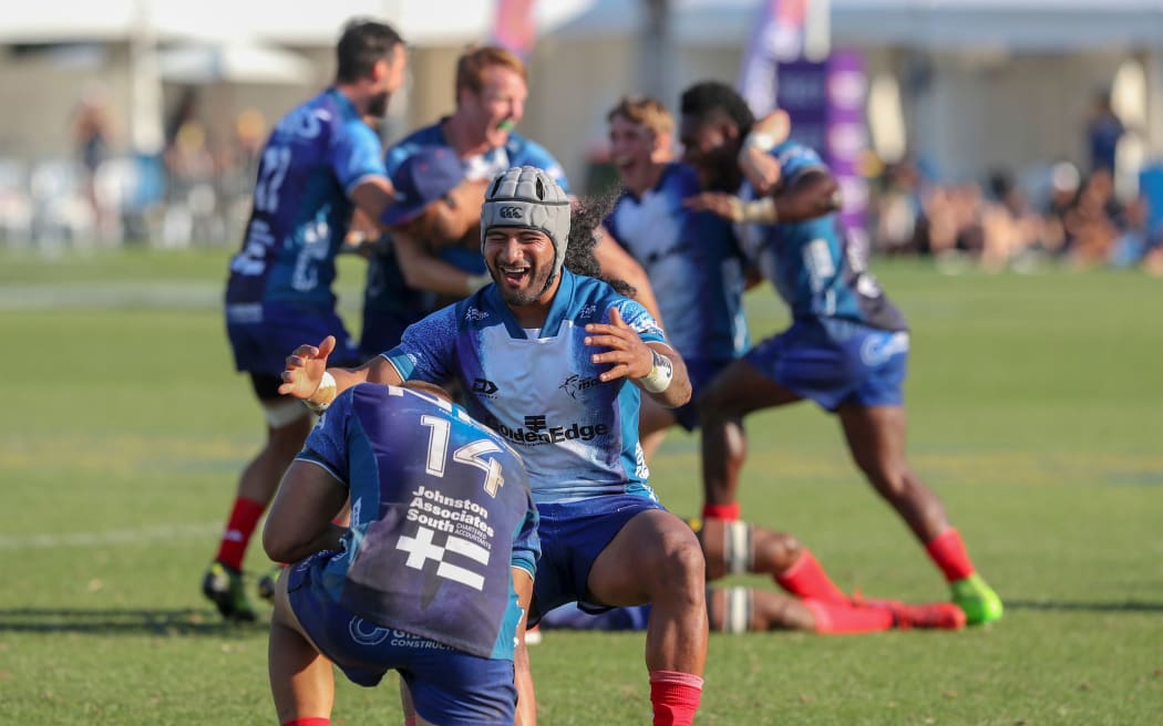 Tasman men celebrate winning the national Sevens Final, 2018.