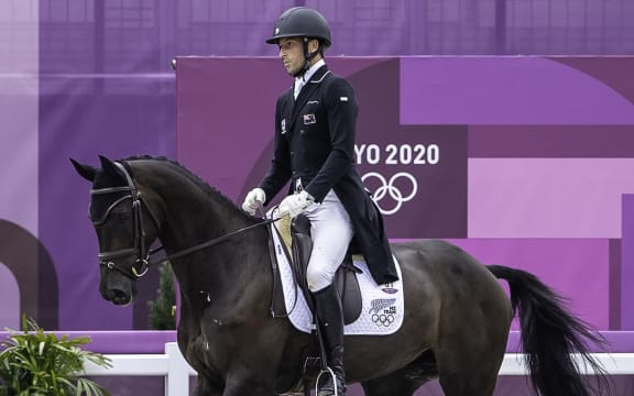 Tim Price rides Vitali during the Eventing Dressage at the Tokyo Olympics.