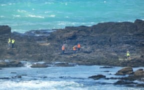 Rescue workers have spent days looking for the two fishermen missing off Slope Point.