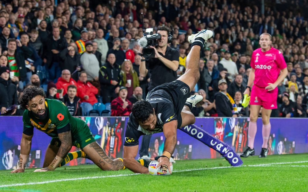 Kiwi Peta Hiku is unable to stay out of touch as he touches the ball down in the goal area against Australia in their semi-final clash at the Rugby League World Cup 2021.