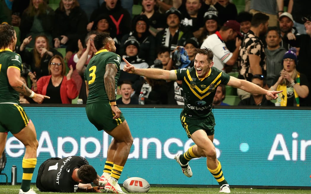 Cameron Murray of the Kangaroos crosses the line to score a try during the 2023 Pacific Championships rugby league match between Australia and New Zealand in Melbourne.