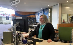 Carterton librarian Andrea Darbyshire is one of dozens of council staff who agreed to a pay freeze.