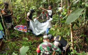 The bodies of Elias Karunggu and Seru Karunggu were recovered later by the military with the assistance of the locals