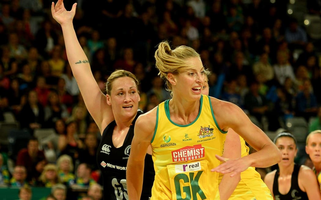 Silver Ferns shooter Cathrine Latu battles with Laura Geitz in Melbourne 2014.