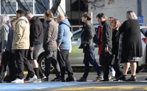 Staff attend a blessing at the central Dunedin Countdown today.