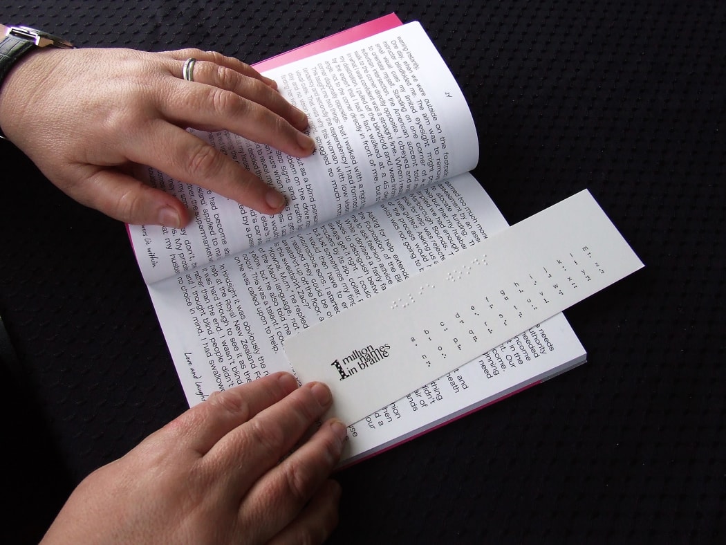 Julie Woods is "connecting the world with dots" by aiming to write one million names in Braille.