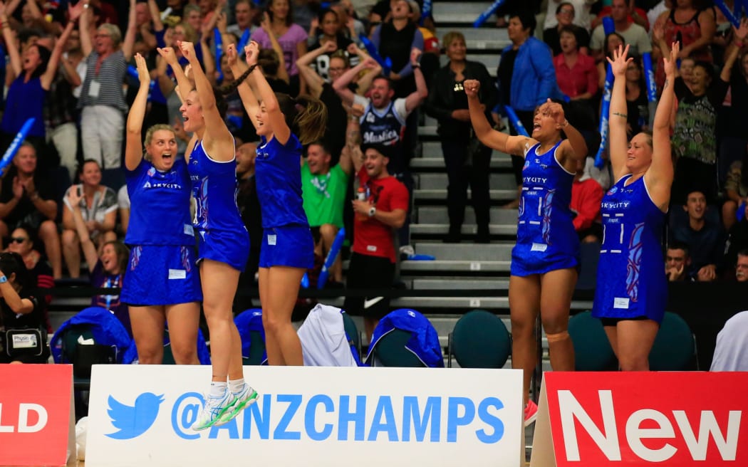 The Mystics bench reacts after Tutaia's long-range shot earns the draw