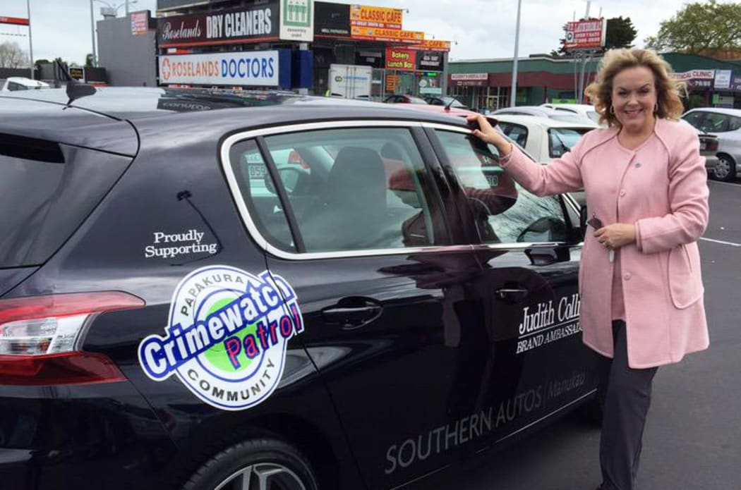 Judith Collins with the car she has been given for six months by a South Auckland company.