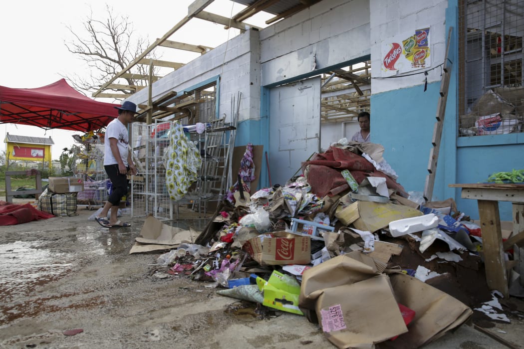 Shop owners are saving what they can but most of their merchandise has been lost.