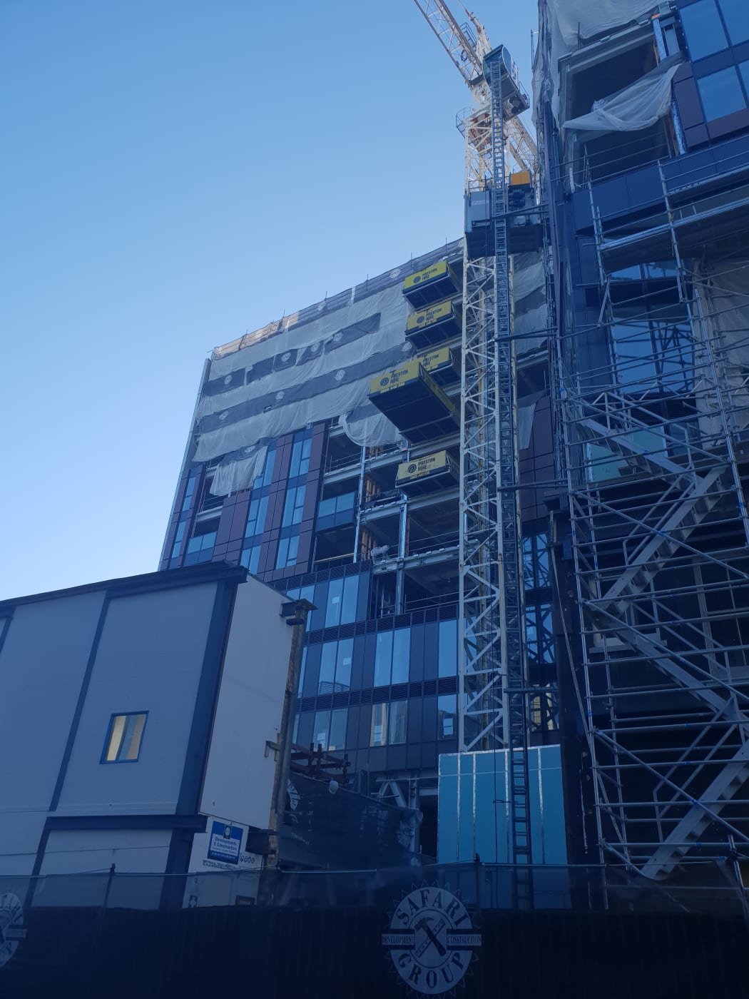 Fire and Emergency services extinguish a blaze at a building site on Graham Street, Auckland.