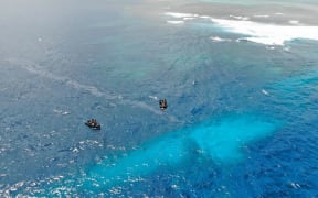 RNZN Naval Divers on the scene above HMNZS Manawanui, off the southern coast Of Upulo.