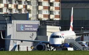 A British Airways passenger jet at London City Airport, last month the company suspended all flights until the end of April due to the coronavirus outbreak.