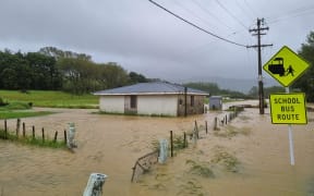 Flooded roads in Kaipara District, Northland.