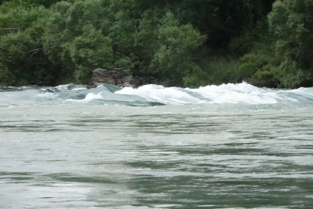 New white-water rapids in the Clutha River created by downpours around Central Otago.