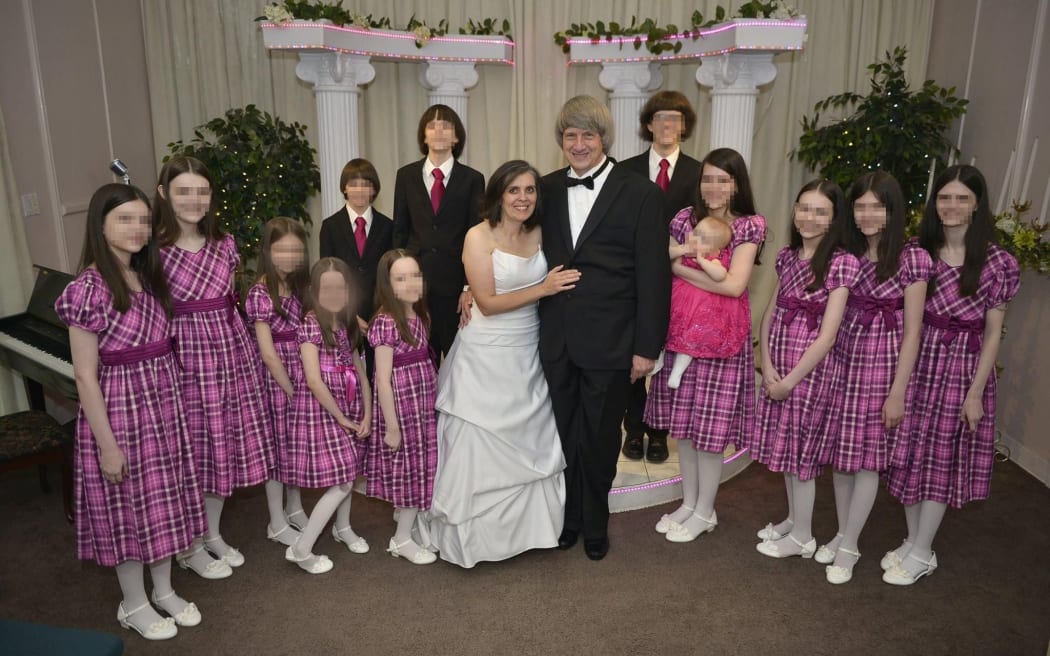 The Turpin family pose for a photo after the parents renewed their wedding vows in Las Vegas.
