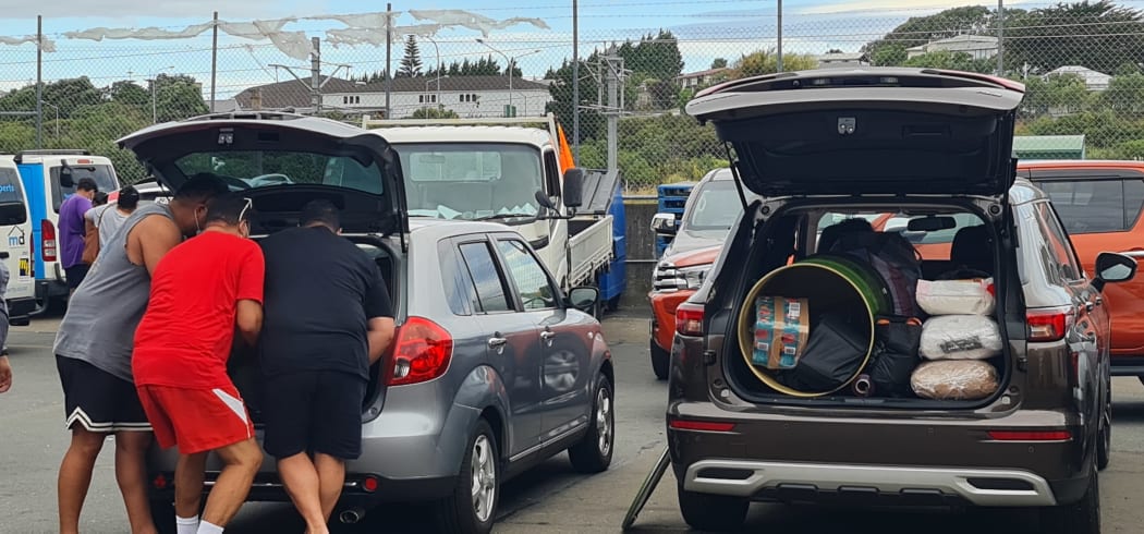 Families either brought their empty drums to pack onsite or brought them already filled