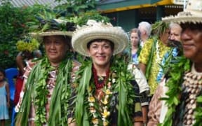 The Governor General is adorned with garlands at Atupare Marae