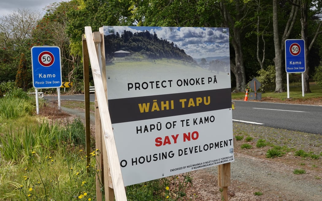 A billboard beside the Onoke Heights housing development site.