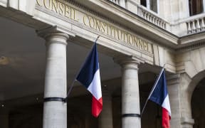 This photograph shows a view of the entrance of the French Constitutional Council in Paris on October 8, 2025. (Photo by Martin LELIEVRE / AFP)