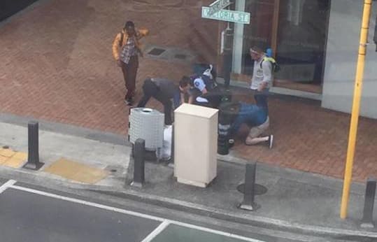 Passersby helped subdue the man until more police could arrive.