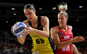 Amelia Walmsley of the Central Pulse and Jane Watson of the Tactix tussle for the ball during the ANZ Premiership Netball match, Tactix Vs Pulse, at Wolfbrook Arena, Christchurch, New Zealand, 15th June 2025. Copyright photo: John Davidson / www.photosport.nz