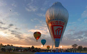 The hot air balloon Morton is seen in this photo about to take to the skies for a round-the-world trip from Northam in Western Australia.
