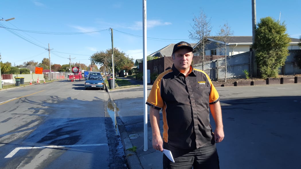 Darren Carlaw outside his business The Naked Baker in North Brighton, which has been hemmed in by roadworks for months.