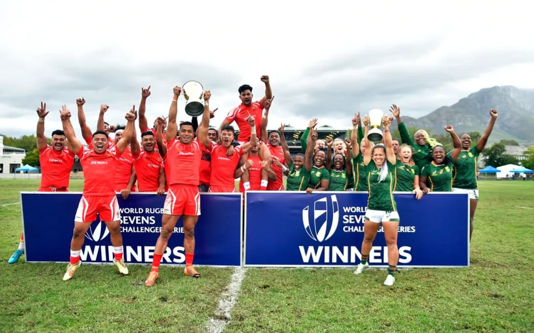 The Tongan men's team and South Africa's women celebrate their victories