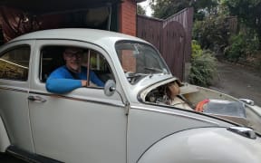 Carl Penwarden with his retrofitted VW Beetle.